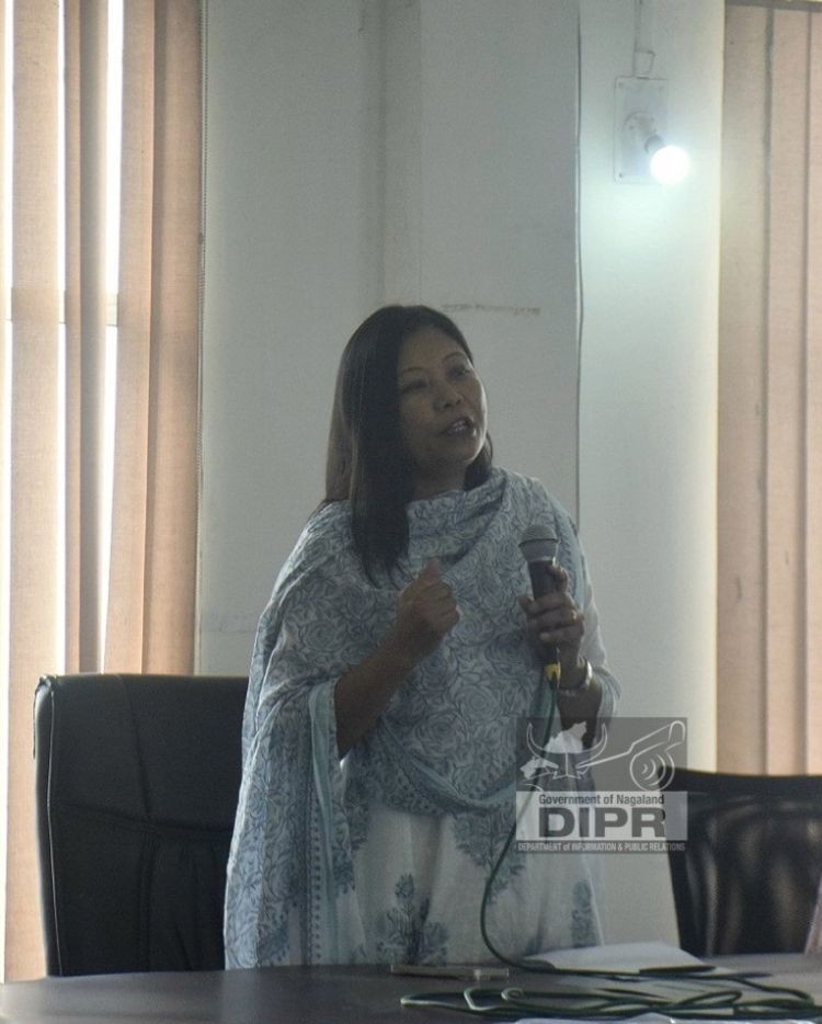 Advisor Hekani Jakhalu addressing the Pradhan Mantri Vishwakarma on boarding programme at DPDB Hall DC office, Chümoukedima on October 17. (DIPR Photo)